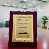 Woodgrain Plaque with Floral Gold-Molded Frame